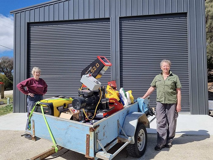 1 glass crusher generator donated trailer & bottles_700x525