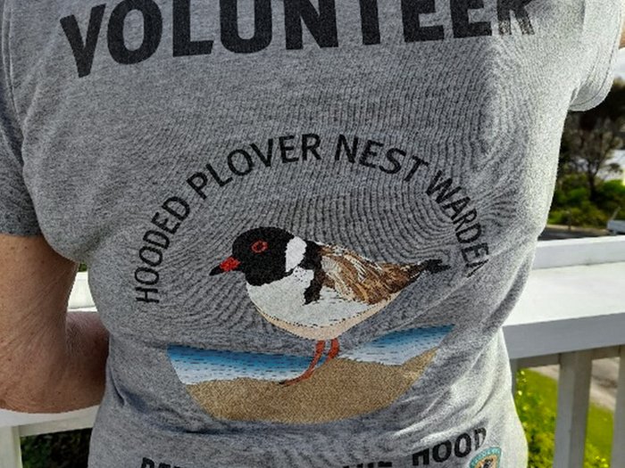Nest warden volunteer, Nat Walter, wearing her official volunteer t-shirt at the 2021/22 end-of-season de-brief.