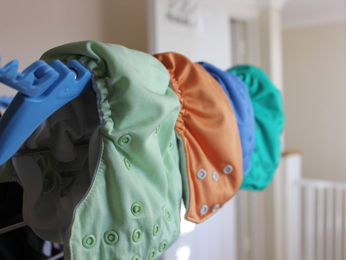 eco-friendly-reusable-diapers-hanging-on-drying-ra-2023-11-27-04-55-09-utc